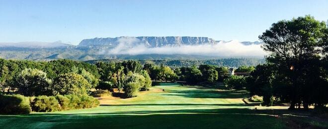 Chateau l'Arc Golf Course, in Provence, southeast of France, Sainte Victoire moutain in the morning and tree's shades on fairway Chateau l'Arc Golf Course